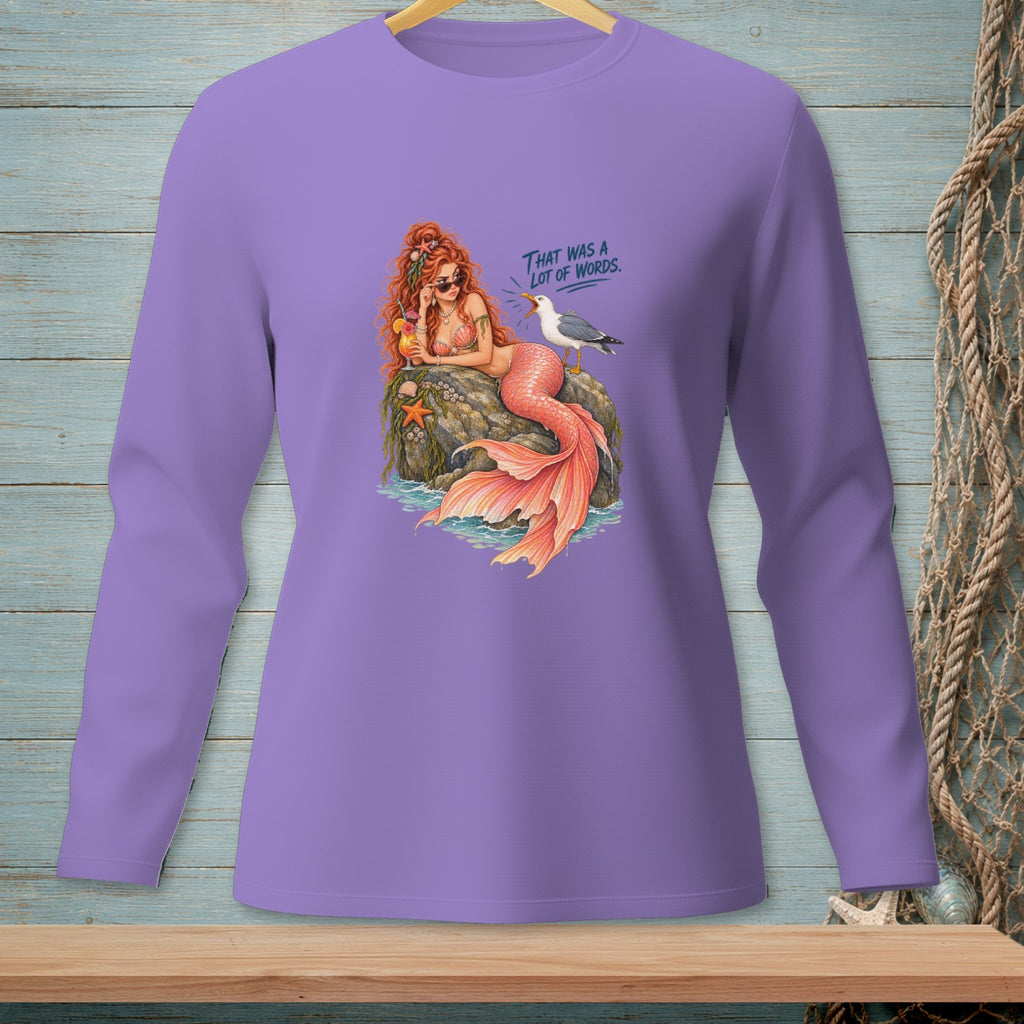 Mermaid with a drink on a rock, and a seagull saying "That was a lot of words."