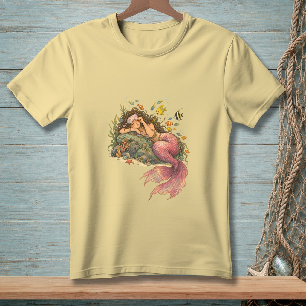 Yellow t-shirt with a sleeping mermaid design surrounded by fish and coral.