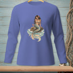 Long sleeve shirt with a mermaid sitting on a rock, surrounded by water.