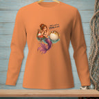 Orange long sleeve shirt with mermaid and pufferfish graphic.