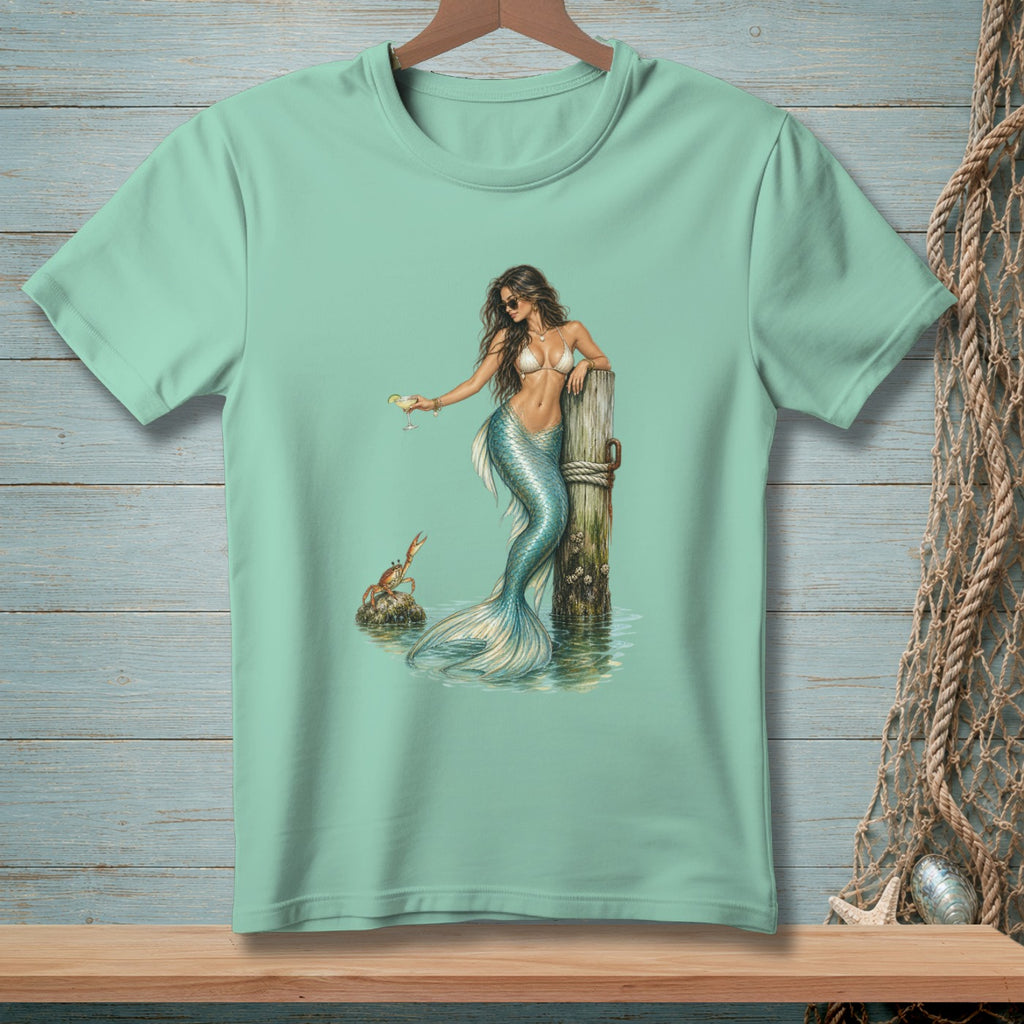 Mermaid with cocktail and crab by a wooden post, graphic design on t-shirt.