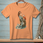 Peach t-shirt with a mermaid sitting on a post with a lobster.
