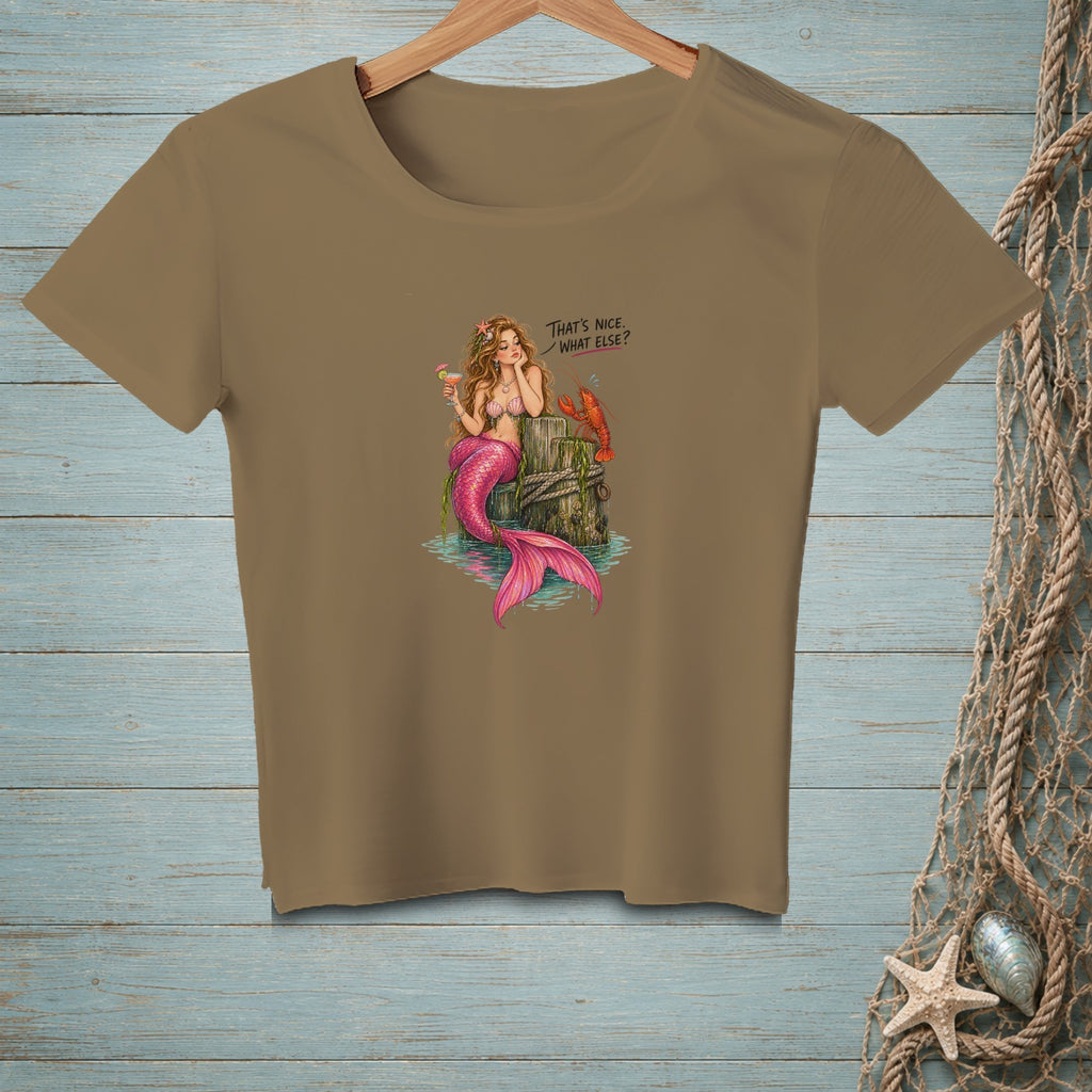 A mermaid with a pink tail and a lobster sit on a post, with text that says "That's nice. What else?".
