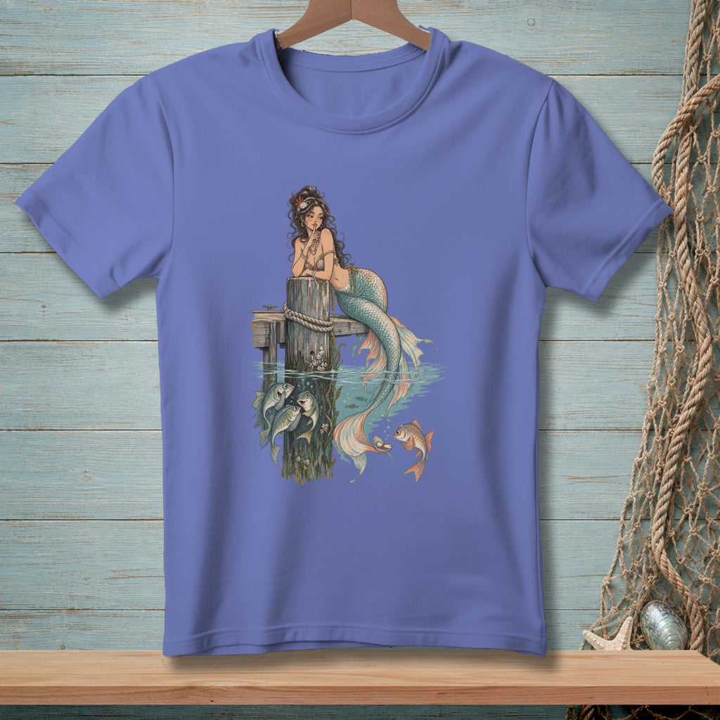 Illustration of a mermaid lounging on a dock post with fish swimming around her.