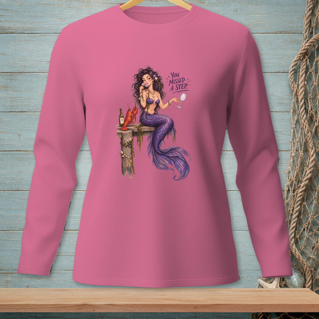 Pink long-sleeve shirt with a mermaid graphic that reads "You Missed A Step."