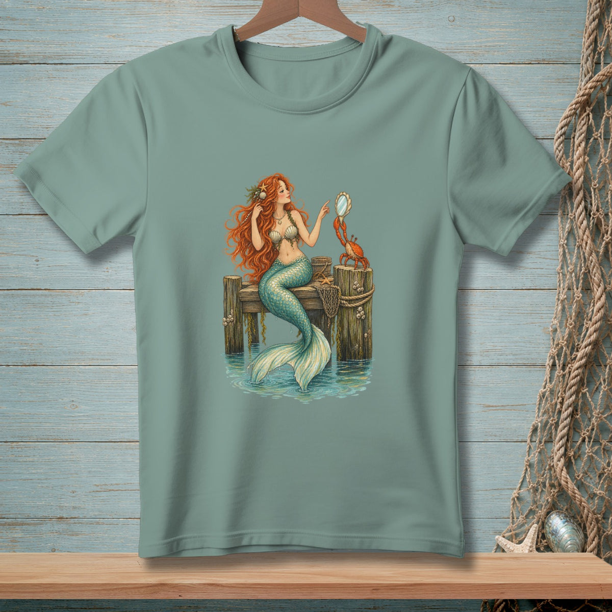 Mermaid with long red hair and crab on a wooden pier, looking in a hand mirror.