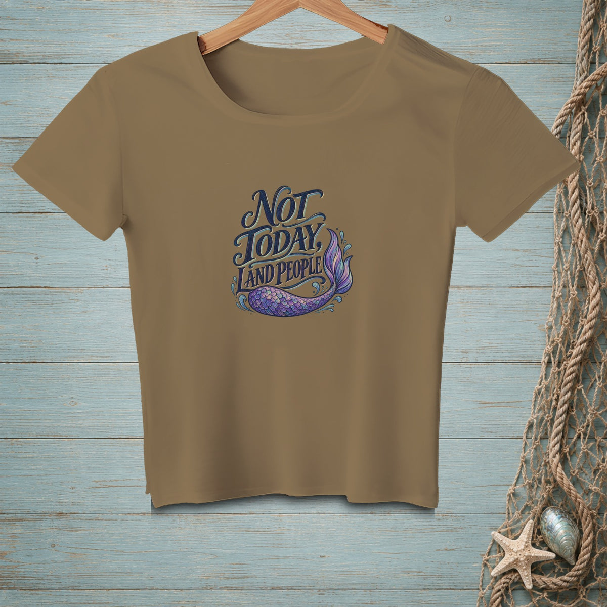 T-shirt with "Not Today, Land People" text and a mermaid tail design.