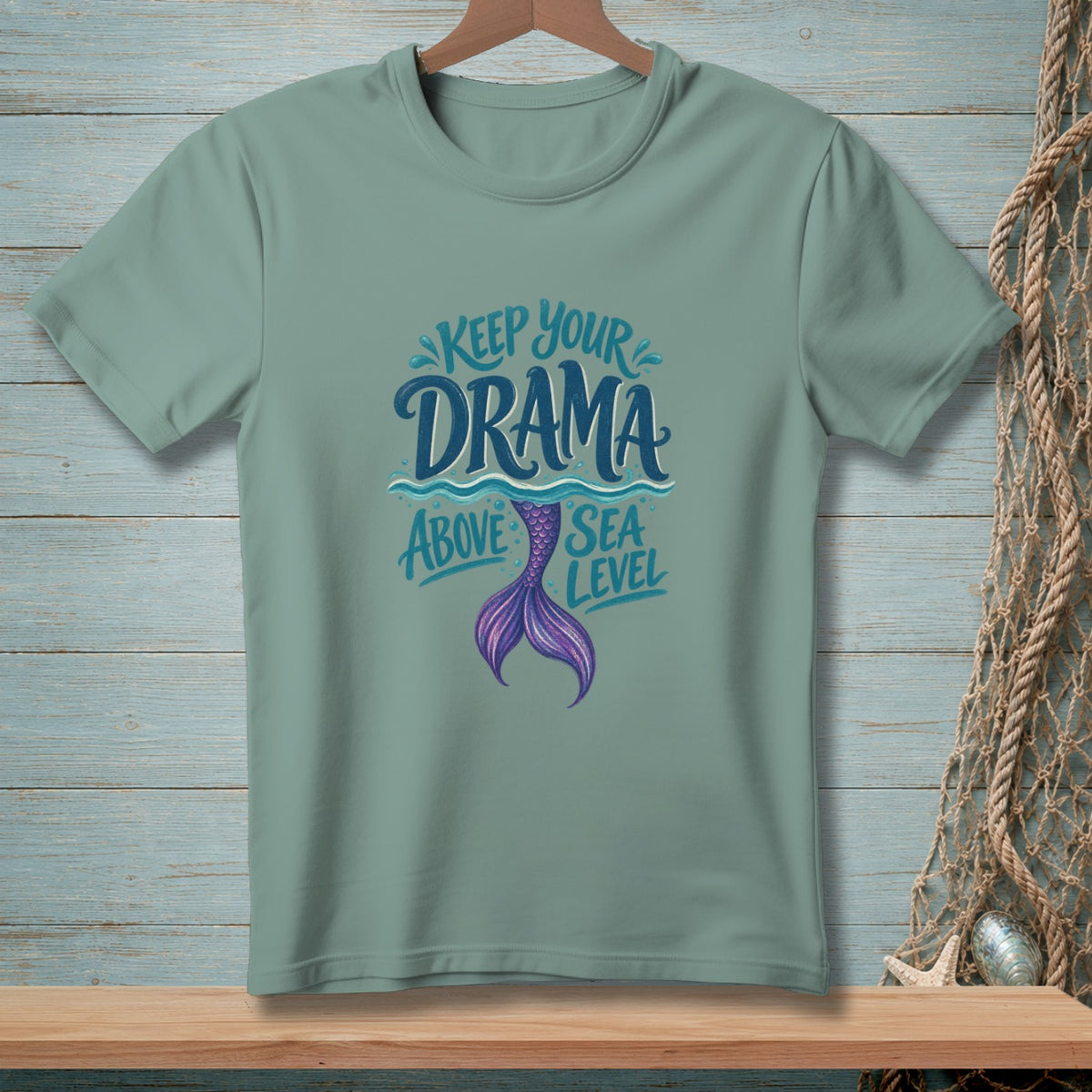 T-shirt with mermaid tail graphic and text "Keep Your Drama Above Sea Level".