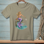 Mermaid with purple tail sits on dock, holding champagne, with a crab and a shell labeled "DONE".