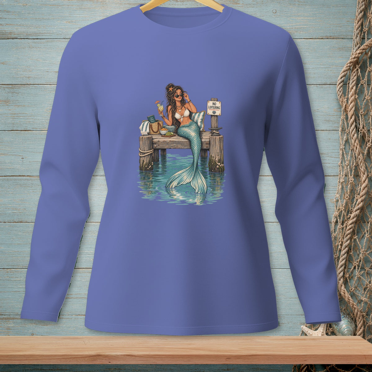 Illustration of a mermaid sitting on a dock with a drink and a "No Loitering" sign.