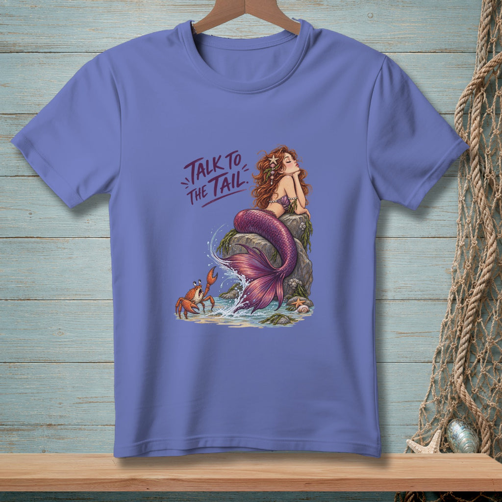 Purple t-shirt with a mermaid and crab design and text "Talk to the Tail".