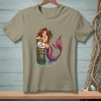A mermaid leans against a post with a "No Vacancy" sign, her tail in water.