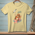 Yellow t-shirt with mermaid and seagull design, saying "I PLAN FOR NONSENSE."