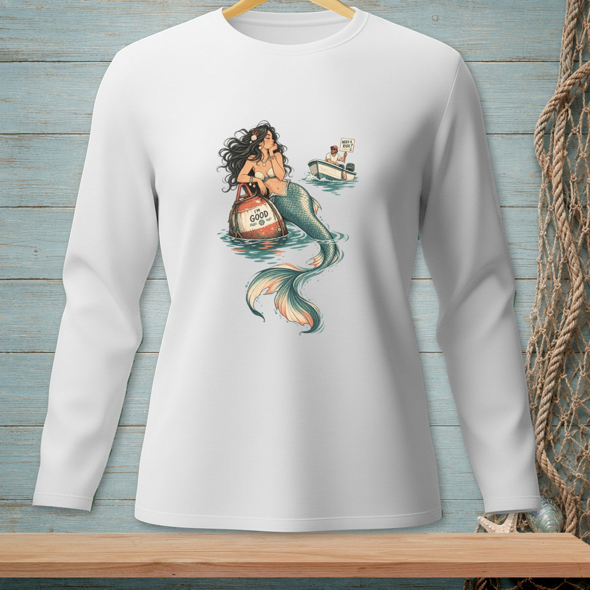 Mermaid with bag reading "I'm GOOD" near a boat with a man asking "Need a ride?".