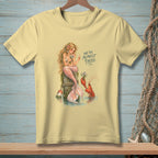 Light yellow t-shirt with mermaid and lobster graphic, text "WE'RE ALMOST THERE."