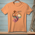 Mermaid and pufferfish graphic with text "That's a lot of drama per inch".