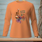 Mermaid, octopus, and seagull with text "Delegation is Self-Care" on orange shirt.