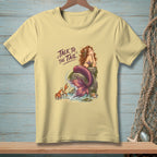 Yellow t-shirt with mermaid, crab, and text "Talk to the Tail."