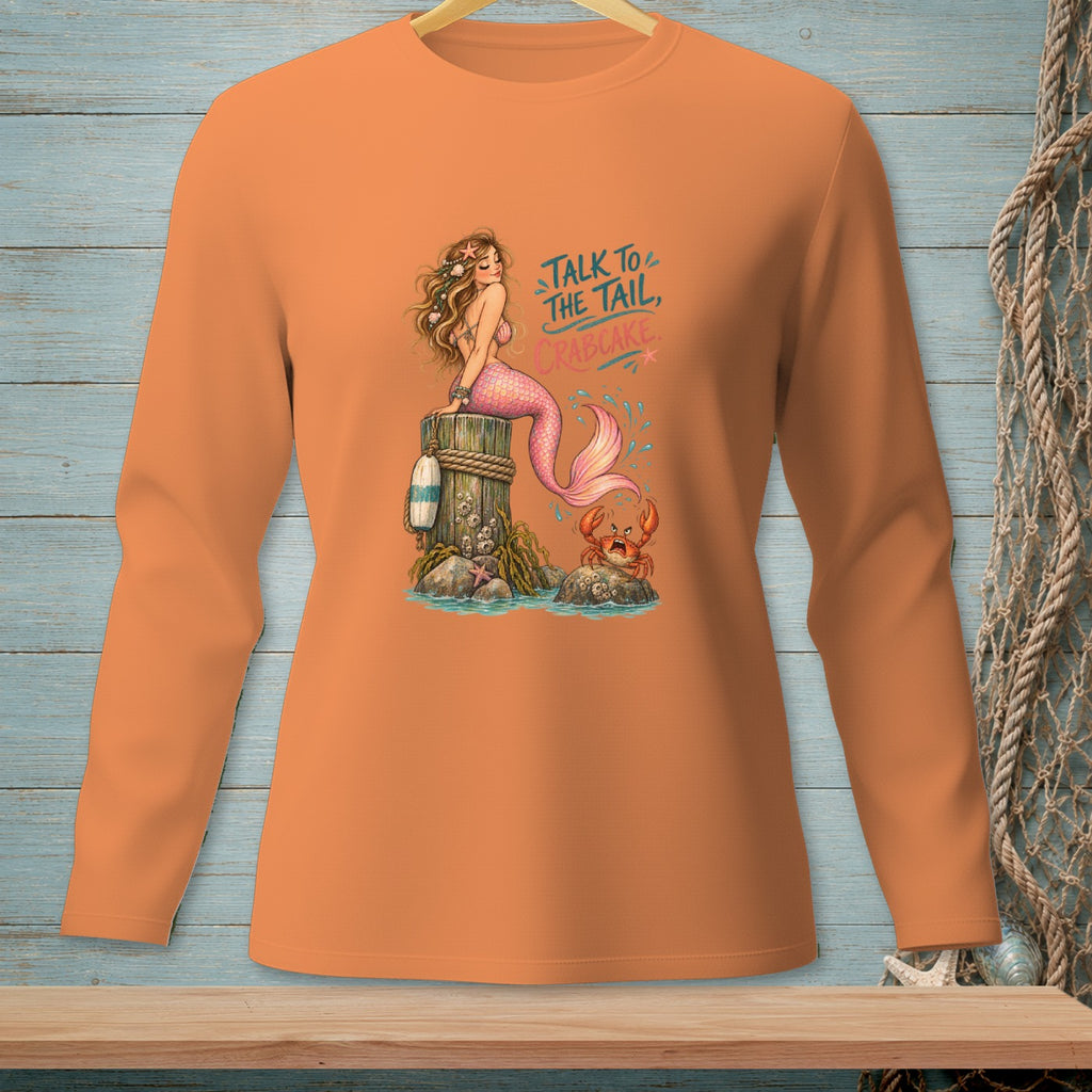 Orange long-sleeve shirt with mermaid, crab, and text: "Talk to the Tail, Crabcake."
