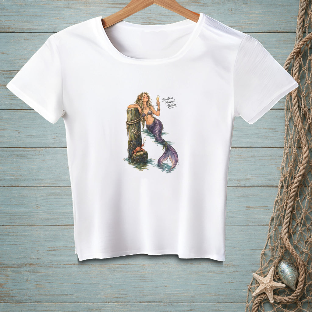White t-shirt with graphic of mermaid, crab, and text "Should've Planned Better."