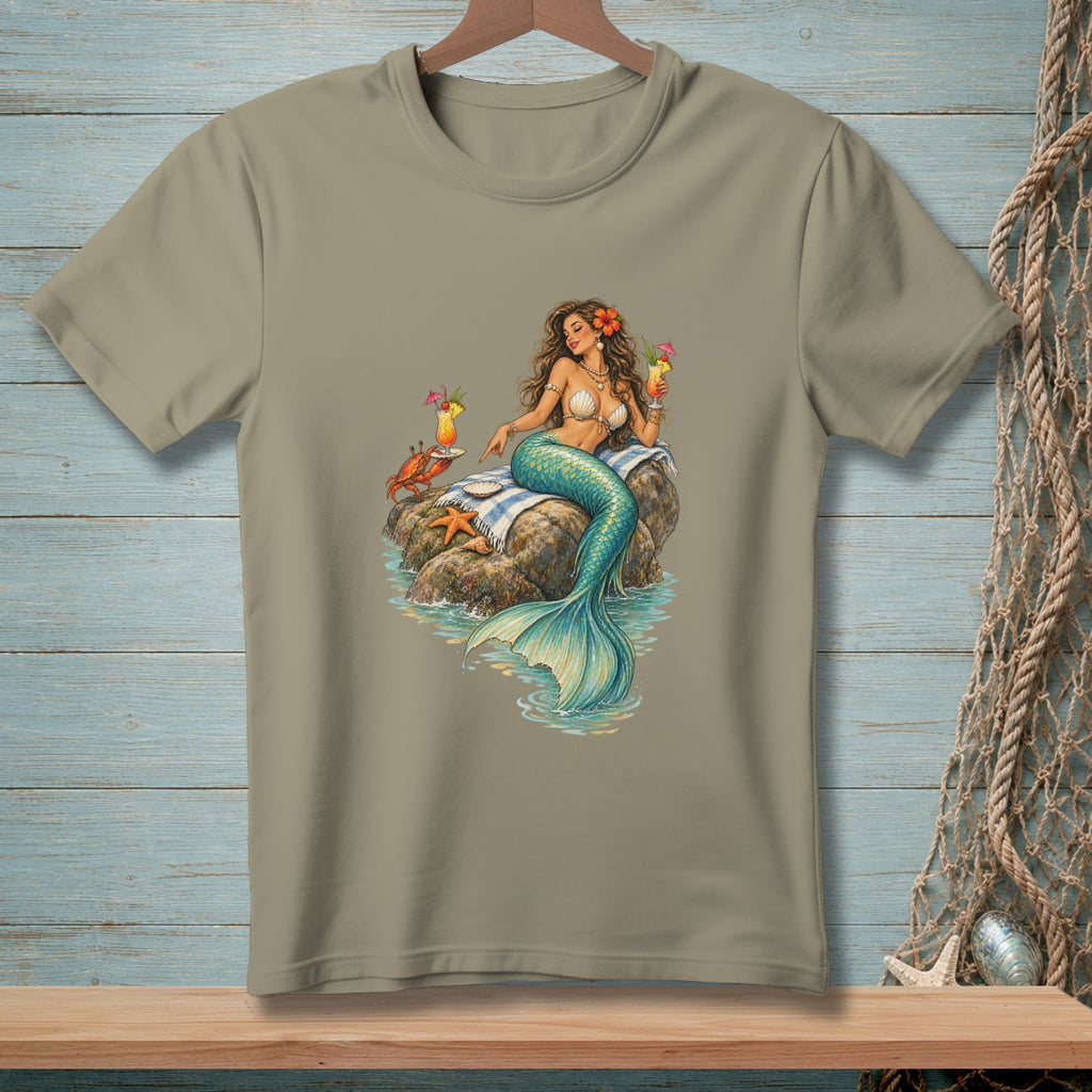 T-shirt graphic of a mermaid with drinks and a crab on rocks.