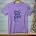 Purple t-shirt with "Don't Test the Waters" text, mermaid tail, and crab graphic.