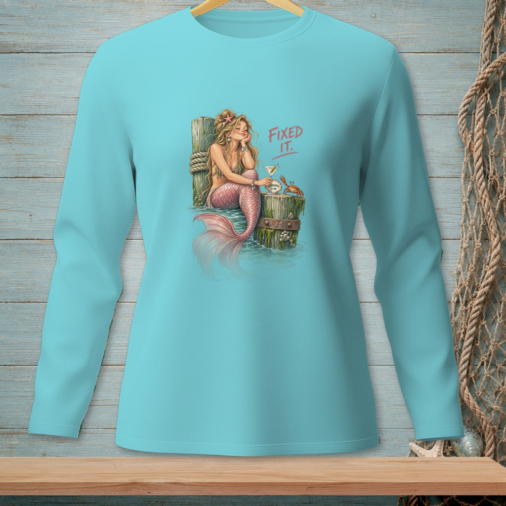 Turquoise long-sleeve shirt with a mermaid, martini, crab, and text "FIXED IT."