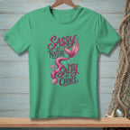 Green t-shirt with text "Sassy by Nature Salty by Choice" and a mermaid tail.