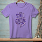 Purple t-shirt with "I have a tail and an attitude" and mermaid tail graphic.