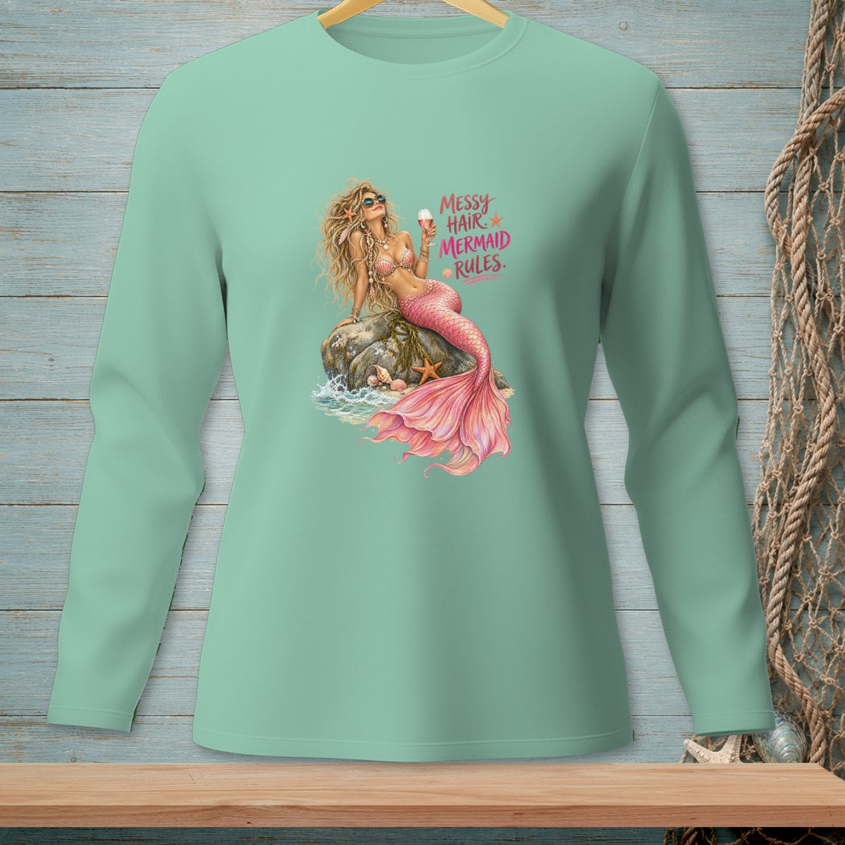 Mint long-sleeve shirt with a mermaid graphic that says "Messy Hair Mermaid Rules."