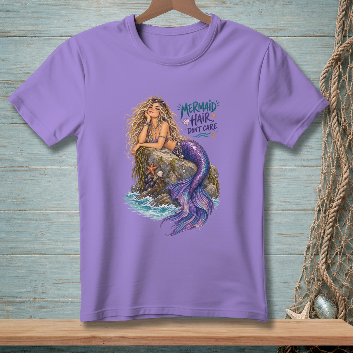 Purple t-shirt with a mermaid graphic and text "Mermaid Hair Don't Care".