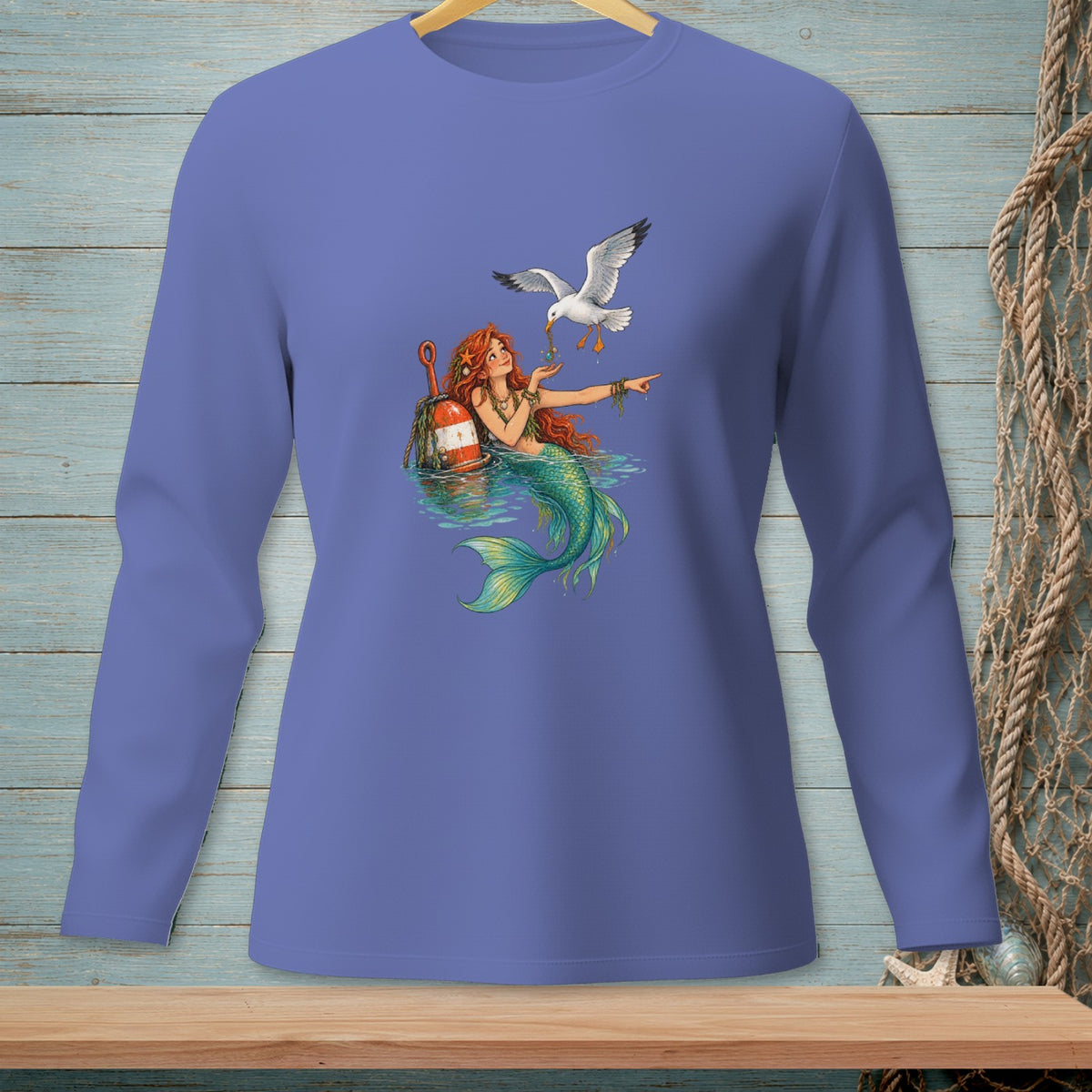 Mermaid with seagull and buoy on a purple long-sleeved shirt.