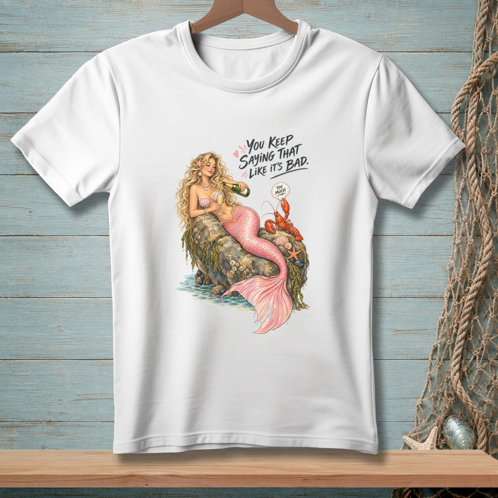White t-shirt with mermaid, lobster, and text: "You Keep Saying That Like It's Bad."