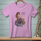Mermaid on a rock with a drink, a crab, and text.