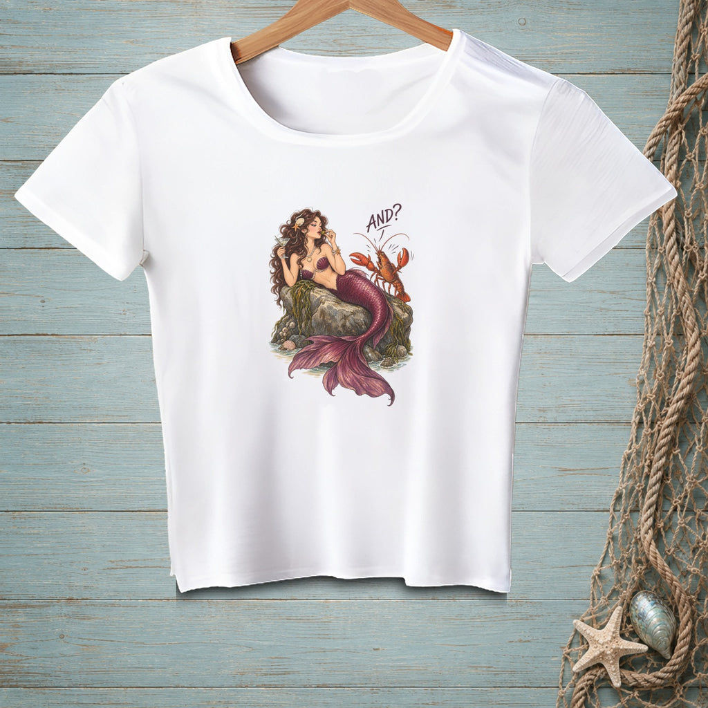 White t-shirt with illustration of a mermaid and lobster, text "AND?".