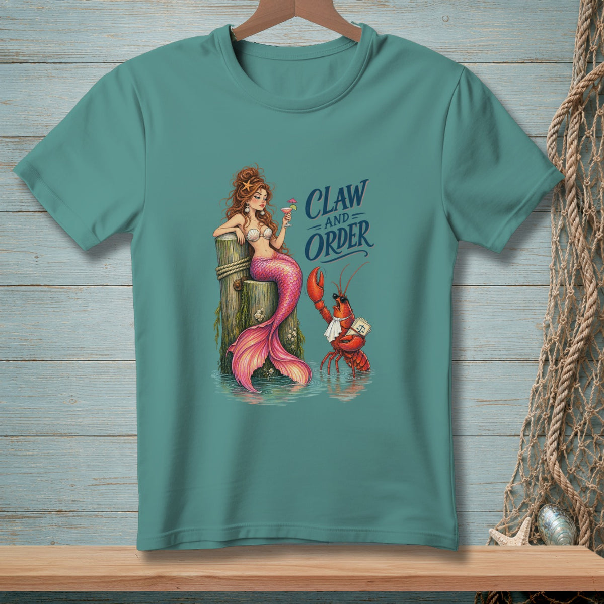 Mermaid with cocktail and lobster wearing a tie and badge, text "Claw and Order".