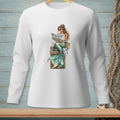 Long sleeve white shirt with a mermaid reading a magazine on a pier.