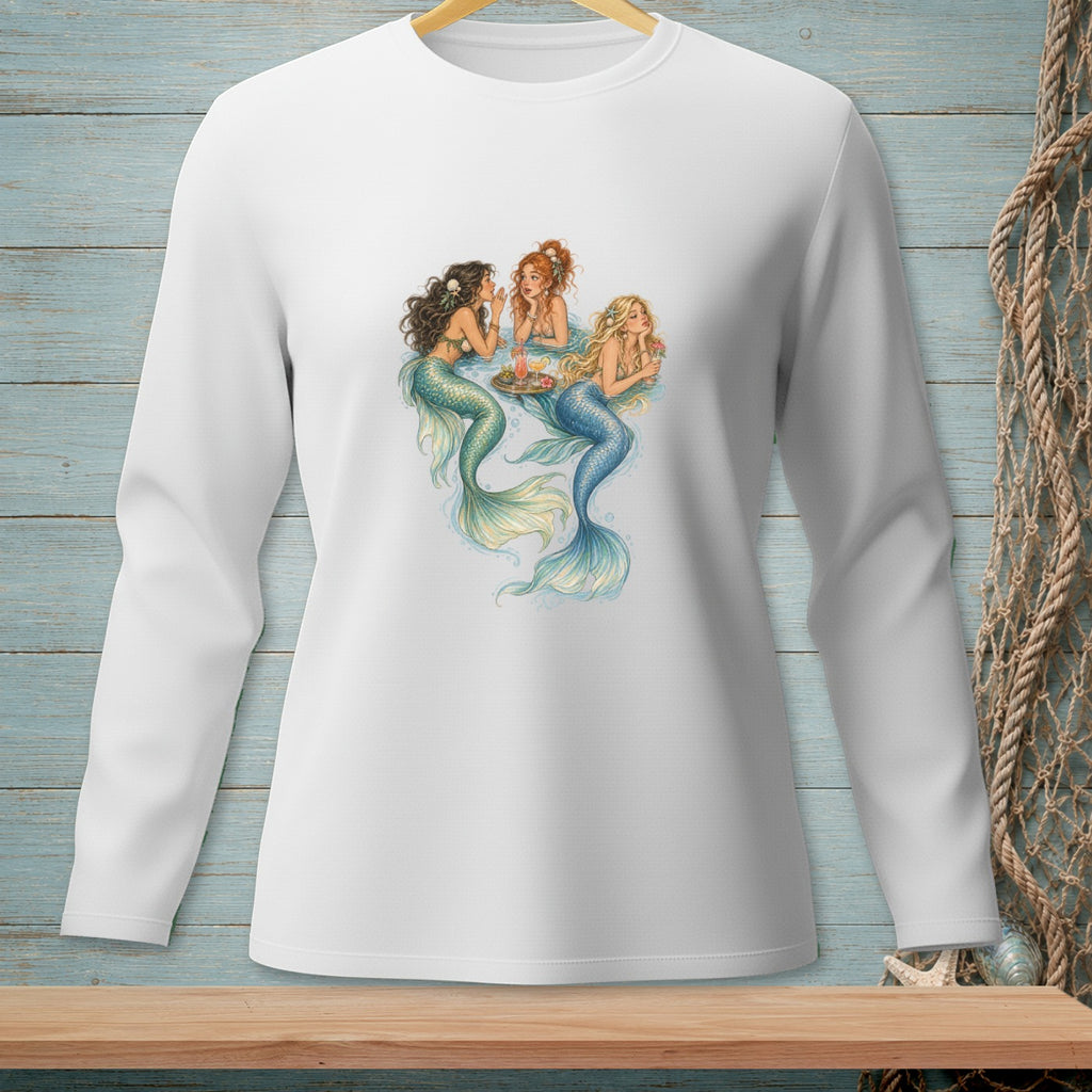 White long-sleeved shirt with three mermaids gathered around a tray of drinks.