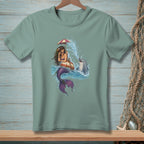 Mermaid on a float with a dolphin in splashing water under an umbrella.