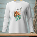 Mermaid with red hair, green tail, and a seagull by a buoy on a white long-sleeved shirt.