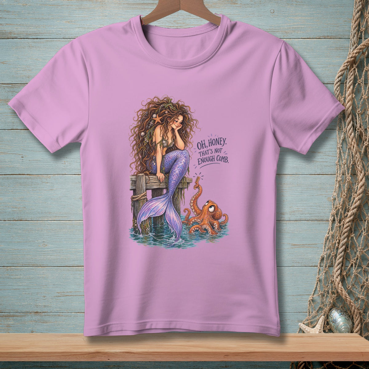 Mermaid on pier with octopus, "Oh, honey. That's not enough comb." text.