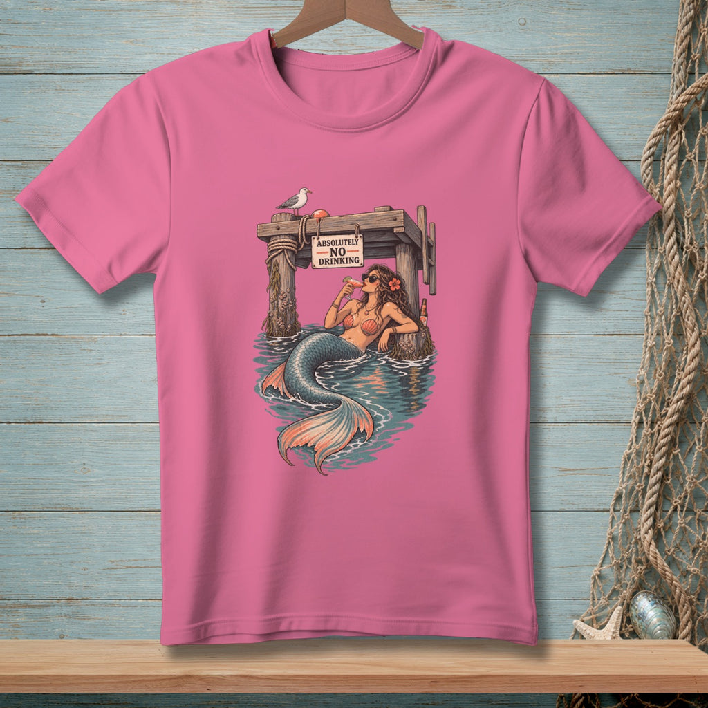 Pink t-shirt with illustration of a mermaid at a dock, "Absolutely No Drinking" sign.
