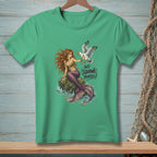 Mermaid with bird on rock, text "GO SQUAWK YOURSELF." on green shirt.