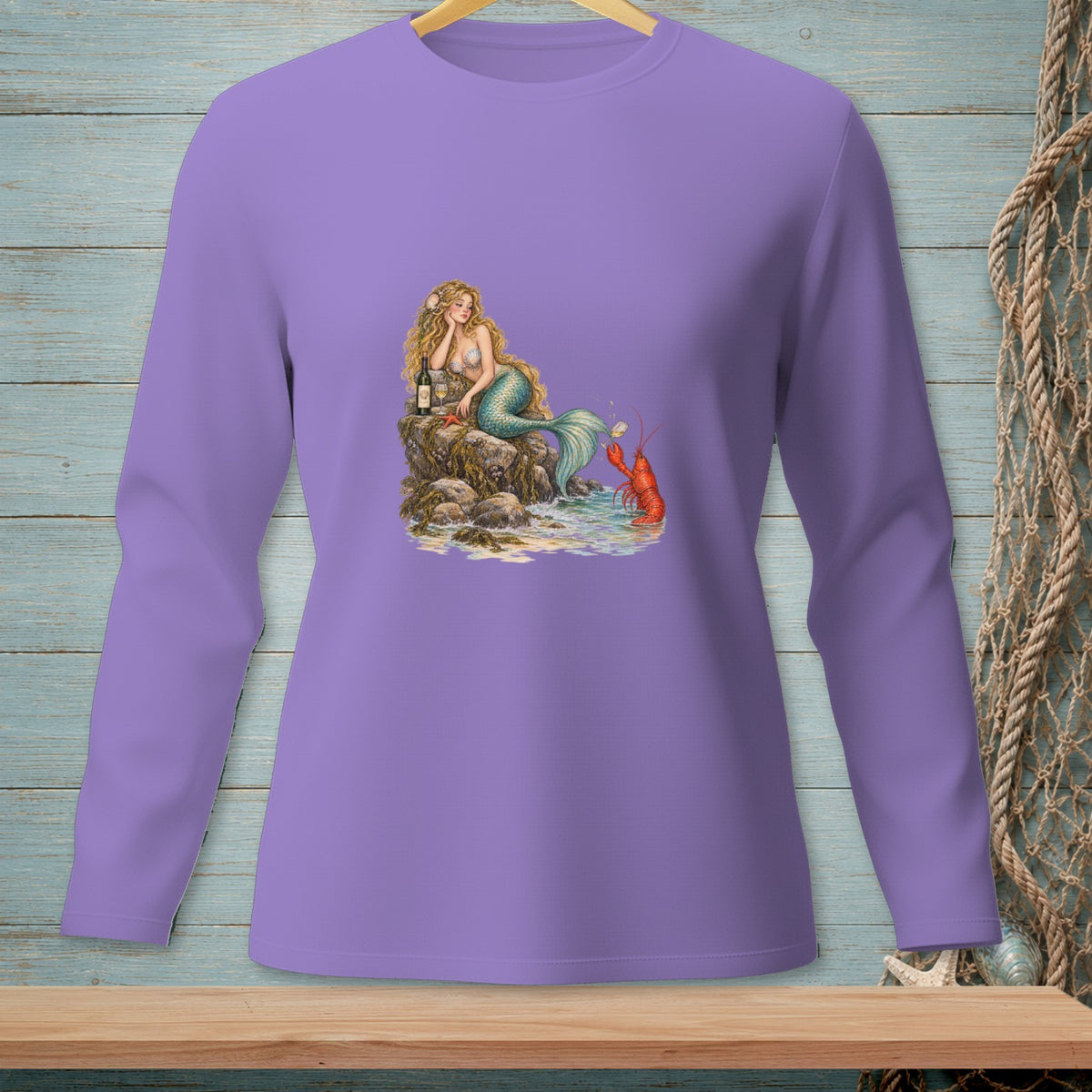 Mermaid sitting on rocks with wine and a lobster by the water.