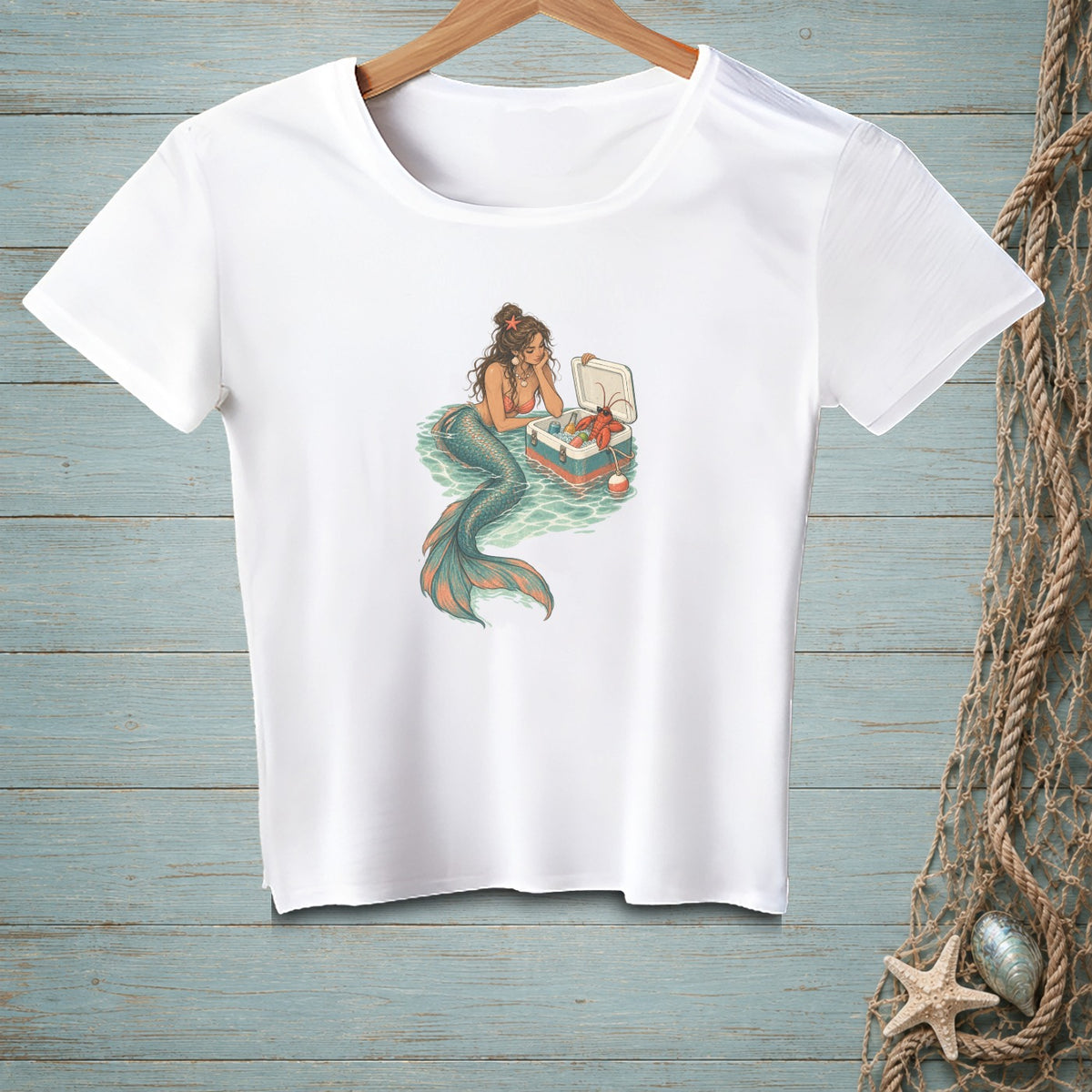 Mermaid with a cooler full of seafood and a lobster sits in turquoise water.