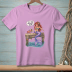 Mermaid and crab on pier with text "Put That Anywhere Else."