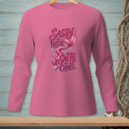 Pink long-sleeve shirt with a sassy mermaid tail graphic and text.
