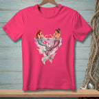 Two mermaids with cakes float in heart-shaped water on a pink t-shirt.