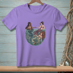 Three mermaids in a circle design, with one holding a shell and cupcake.