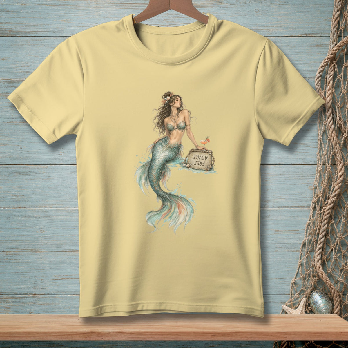 Light yellow t-shirt with watercolor mermaid graphic and "FREE ADVICE" sign.